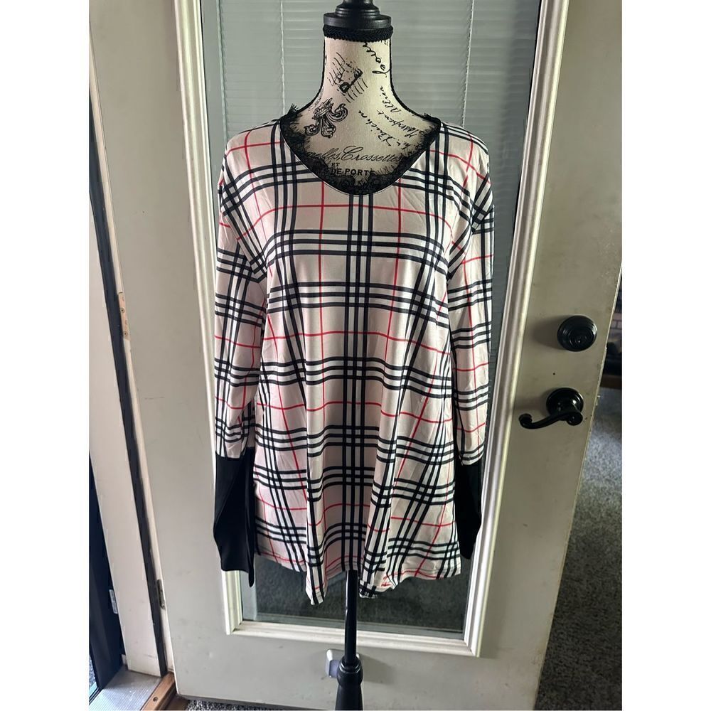 NWT tan and black plaid long sleeve top. Bottom, black part of the sleeve is a h